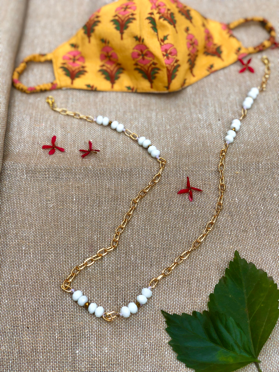 Gold Chain With White Cut Beads